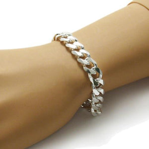Classic Sterling Silver Cuban Link Chain Bracelet in 11mm (Gauge 300) width. Available in 8" and 9" Lengths.