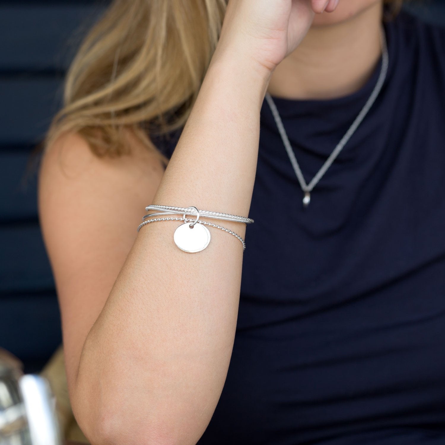 4 Bangle Bracelets with an Oval Tag - Joyeria Lady