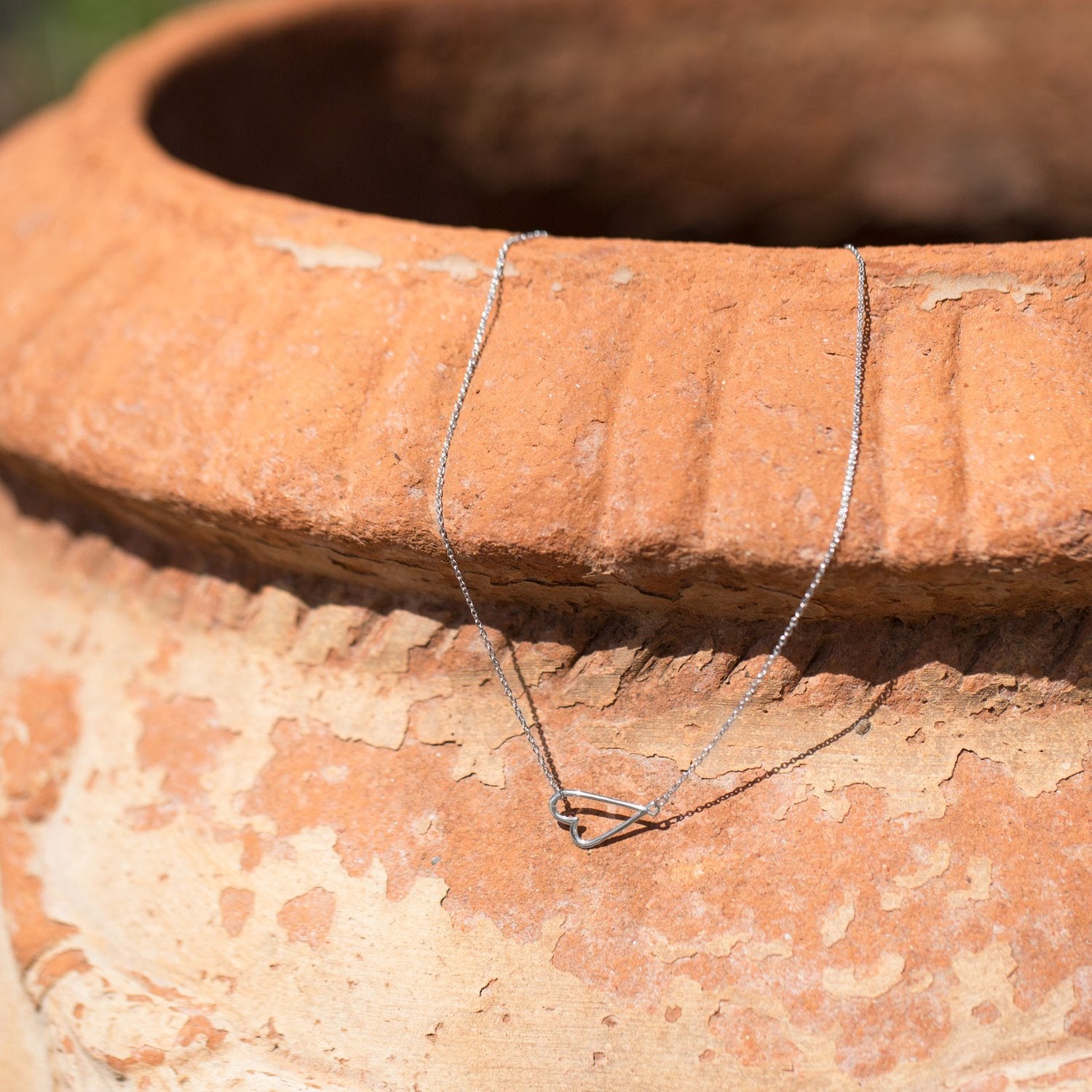 16" + 2" Rhodium Plated Sideways Heart Necklace - Joyeria Lady