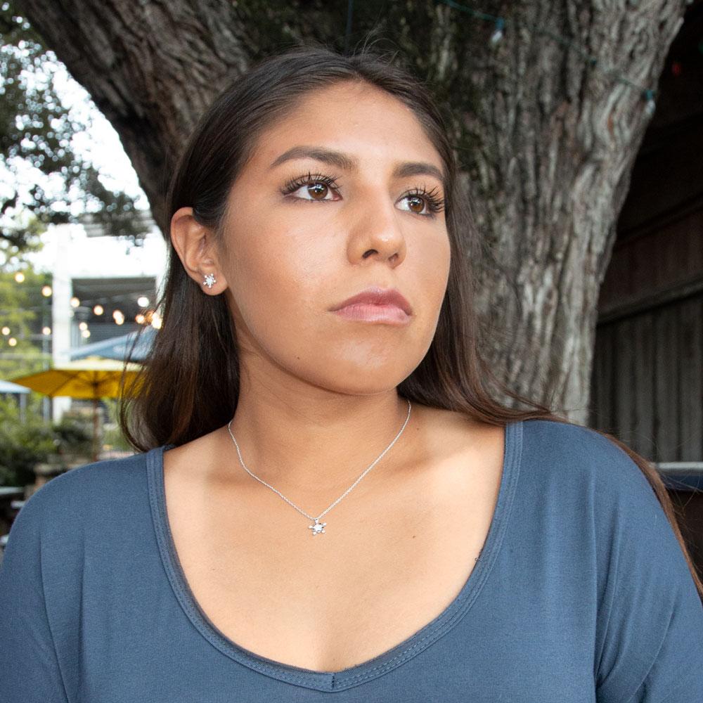 Rhodium Plated Tiny Snowflake CZ Stud Earrings - Joyeria Lady